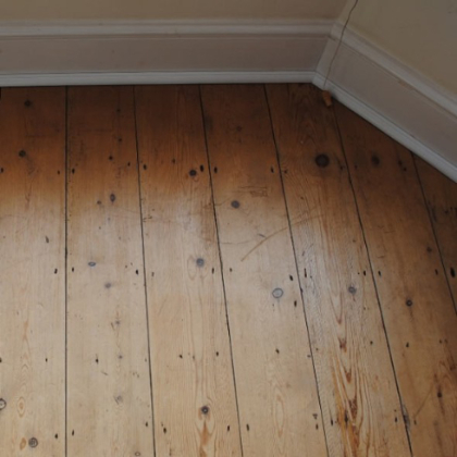 A beautiful wooden floor with DraughtEx fitted between the gaps