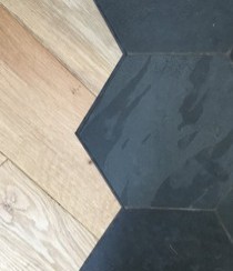A wooden floor with DraughtEx fitted between the gaps