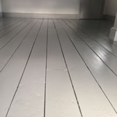 White painted floor with DraughtEx sealing gaps
